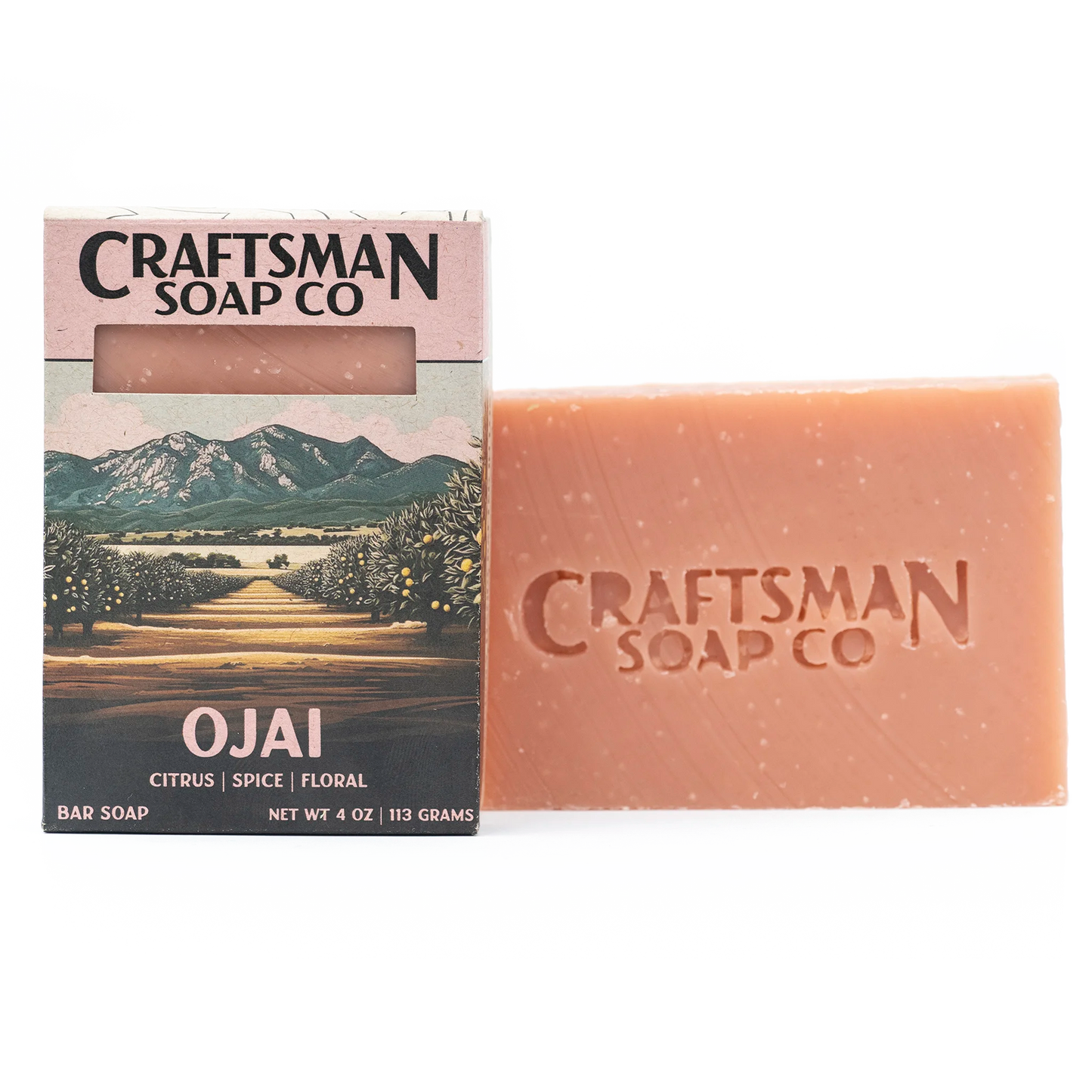 Ojai natural handmade soap bar by Craftsman Soap Co, light orange with brand stamp, beside orange grove sunset gift box, essential oils, cold process